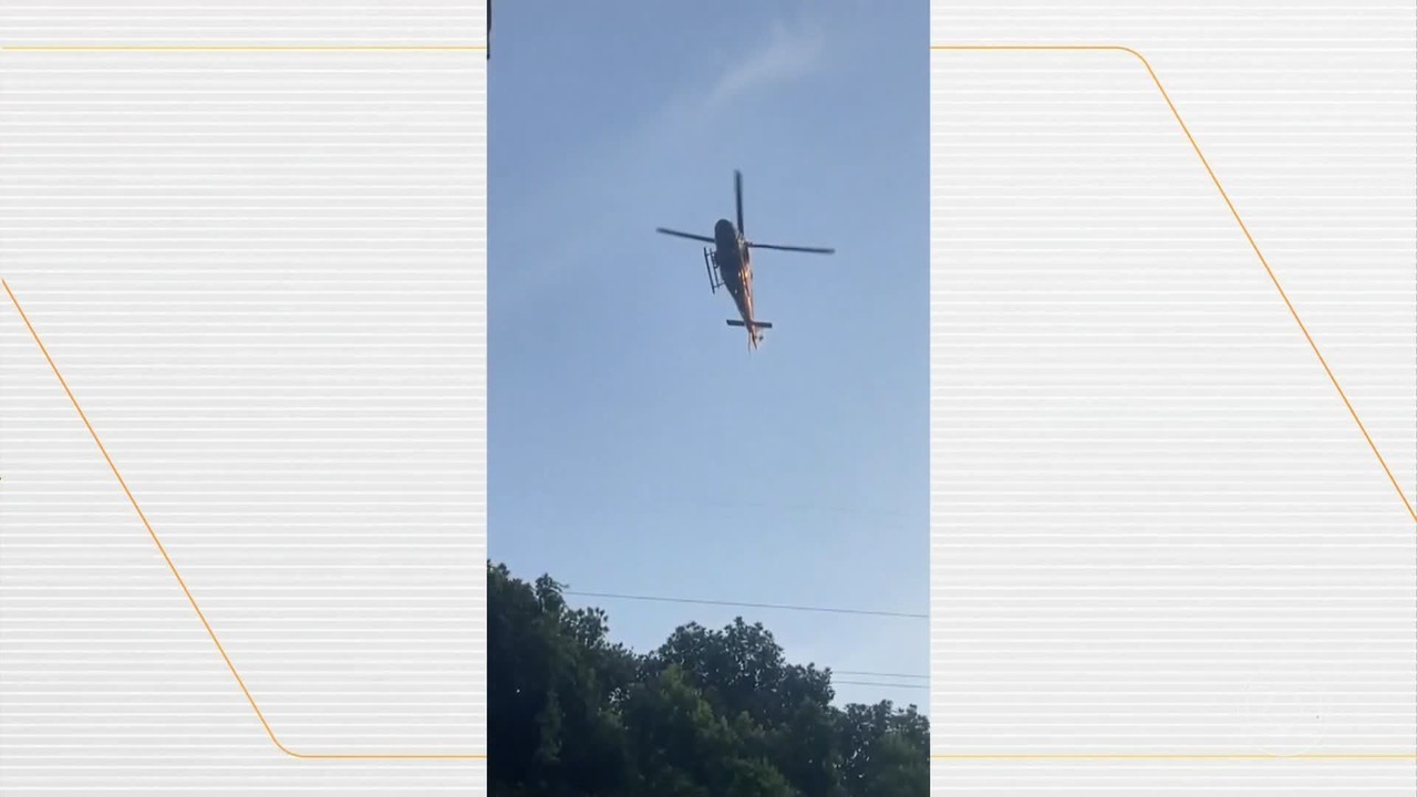 Helicóptero da polícia desvia de tiros no RJ e esbarra em fios